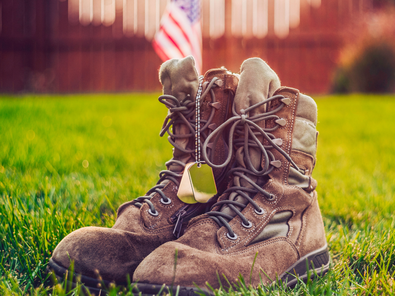 Military boots with dog tags